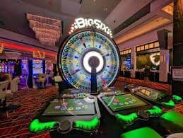 Bingo lobby showing card purchase options, session times, and prize pools on asian bookies